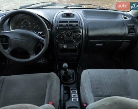 Зелений Міцубісі Харизма, об'ємом двигуна 1.6 л та пробігом 357 тис. км за 1499 $, фото 14 на Automoto.ua