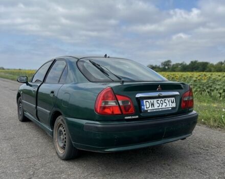 Зелений Міцубісі Харизма, об'ємом двигуна 1.9 л та пробігом 300 тис. км за 1429 $, фото 3 на Automoto.ua
