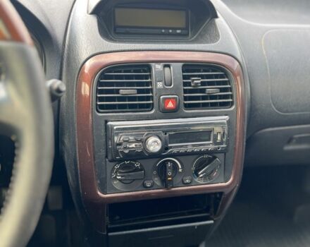 Зелений Міцубісі Харизма, об'ємом двигуна 1.9 л та пробігом 300 тис. км за 1429 $, фото 7 на Automoto.ua