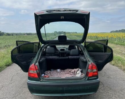 Зелений Міцубісі Харизма, об'ємом двигуна 1.9 л та пробігом 300 тис. км за 1429 $, фото 4 на Automoto.ua