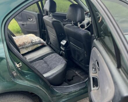 Зелений Міцубісі Харизма, об'ємом двигуна 1.9 л та пробігом 300 тис. км за 1429 $, фото 5 на Automoto.ua