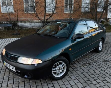 Зелений Міцубісі Харизма, об'ємом двигуна 1.6 л та пробігом 357 тис. км за 1499 $, фото 1 на Automoto.ua