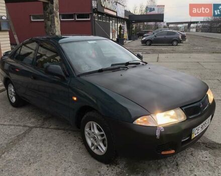 Зелений Міцубісі Харизма, об'ємом двигуна 1.6 л та пробігом 357 тис. км за 1399 $, фото 1 на Automoto.ua