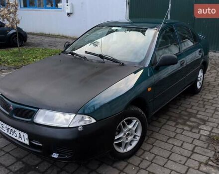 Зелений Міцубісі Харизма, об'ємом двигуна 1.6 л та пробігом 357 тис. км за 1399 $, фото 1 на Automoto.ua