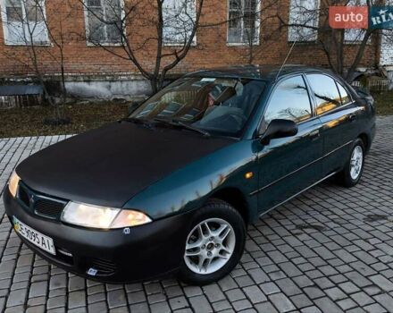 Зелений Міцубісі Харизма, об'ємом двигуна 1.6 л та пробігом 357 тис. км за 1499 $, фото 1 на Automoto.ua