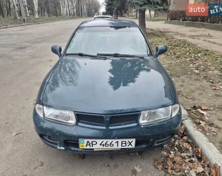 Зелений Міцубісі Харизма, об'ємом двигуна 1.8 л та пробігом 621 тис. км за 1399 $, фото 1 на Automoto.ua