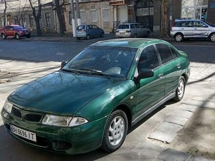 Мицубиси Харизма 1998 в Одессе на Automoto.ua Зеленый Мицубиси Харизма, объемом двигателя 1.9 л и пробегом 300 тыс. км за 3000 $, фото 1 на Automoto.ua