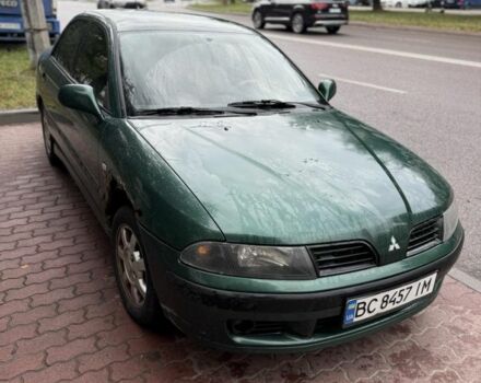Зеленый Мицубиси Харизма, объемом двигателя 1.8 л и пробегом 300 тыс. км за 1400 $, фото 1 на Automoto.ua