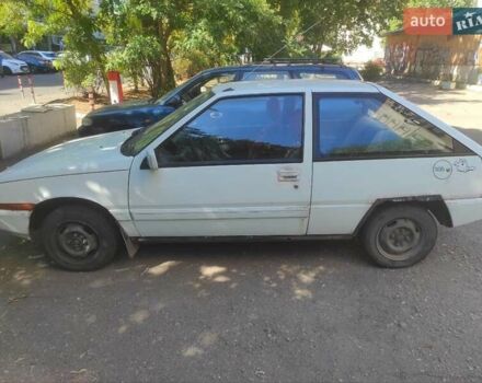 Белый Мицубиси Кольт, объемом двигателя 1.18 л и пробегом 300 тыс. км за 1000 $, фото 3 на Automoto.ua