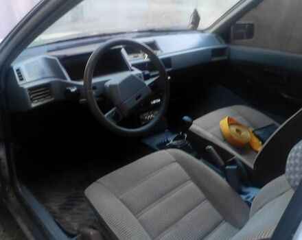 Белый Мицубиси Кольт, объемом двигателя 1.2 л и пробегом 245 тыс. км за 400 $, фото 2 на Automoto.ua