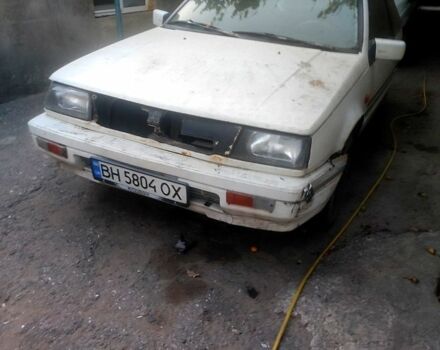 Белый Мицубиси Кольт, объемом двигателя 1.2 л и пробегом 245 тыс. км за 400 $, фото 5 на Automoto.ua