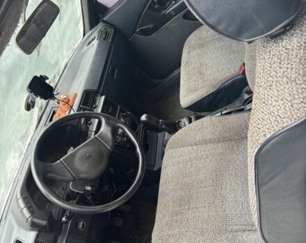 Белый Мицубиси Кольт, объемом двигателя 1.3 л и пробегом 3 тыс. км за 650 $, фото 4 на Automoto.ua