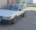 Білий Міцубісі Кольт, об'ємом двигуна 1.3 л та пробігом 300 тис. км за 1000 $, фото 1 на Automoto.ua