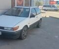 Белый Мицубиси Кольт, объемом двигателя 1.3 л и пробегом 300 тыс. км за 1000 $, фото 1 на Automoto.ua