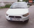 Белый Мицубиси Кольт, объемом двигателя 1.33 л и пробегом 293 тыс. км за 4200 $, фото 1 на Automoto.ua