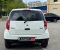 Белый Мицубиси Кольт, объемом двигателя 1.3 л и пробегом 211 тыс. км за 5990 $, фото 3 на Automoto.ua