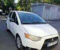 Белый Мицубиси Кольт, объемом двигателя 1.3 л и пробегом 230 тыс. км за 5750 $, фото 1 на Automoto.ua
