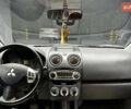 Білий Міцубісі Кольт, об'ємом двигуна 1.33 л та пробігом 138 тис. км за 7200 $, фото 8 на Automoto.ua