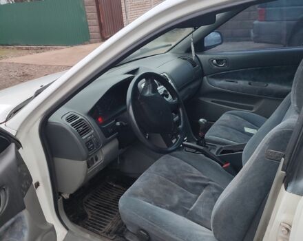 Белый Мицубиси Кольт, объемом двигателя 2 л и пробегом 300 тыс. км за 1500 $, фото 3 на Automoto.ua