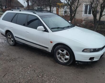 Белый Мицубиси Кольт, объемом двигателя 2 л и пробегом 300 тыс. км за 1500 $, фото 1 на Automoto.ua