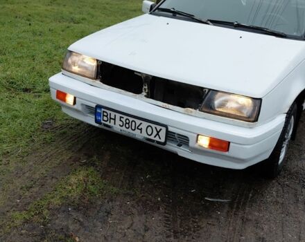 Белый Мицубиси Кольт, объемом двигателя 1.2 л и пробегом 124 тыс. км за 897 $, фото 1 на Automoto.ua