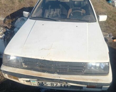 Белый Мицубиси Кольт, объемом двигателя 1.2 л и пробегом 215 тыс. км за 284 $, фото 1 на Automoto.ua