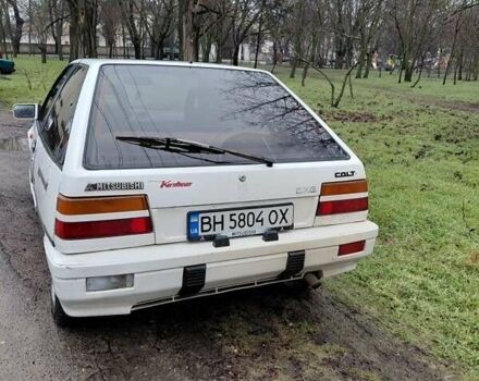 Белый Мицубиси Кольт, объемом двигателя 1.2 л и пробегом 124 тыс. км за 897 $, фото 1 на Automoto.ua