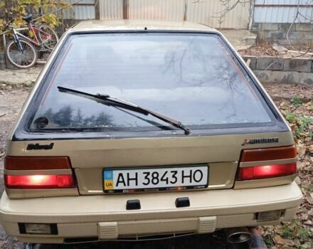 Бежевый Мицубиси Кольт, объемом двигателя 1.8 л и пробегом 100 тыс. км за 406 $, фото 1 на Automoto.ua