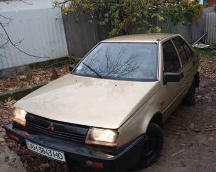 Бежевий Міцубісі Кольт, об'ємом двигуна 1.8 л та пробігом 100 тис. км за 406 $, фото 1 на Automoto.ua