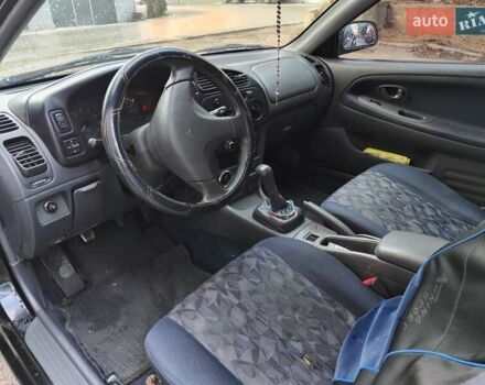 Чорний Міцубісі Кольт, об'ємом двигуна 1.3 л та пробігом 299 тис. км за 800 $, фото 10 на Automoto.ua