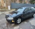 Черный Мицубиси Кольт, объемом двигателя 1.3 л и пробегом 299 тыс. км за 999 $, фото 1 на Automoto.ua