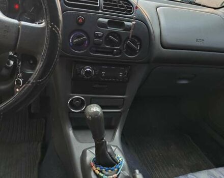 Чорний Міцубісі Кольт, об'ємом двигуна 1.3 л та пробігом 299 тис. км за 800 $, фото 8 на Automoto.ua