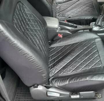 Чорний Міцубісі Кольт, об'ємом двигуна 1.3 л та пробігом 258 тис. км за 3650 $, фото 5 на Automoto.ua