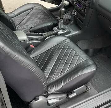 Чорний Міцубісі Кольт, об'ємом двигуна 1.3 л та пробігом 258 тис. км за 3650 $, фото 6 на Automoto.ua