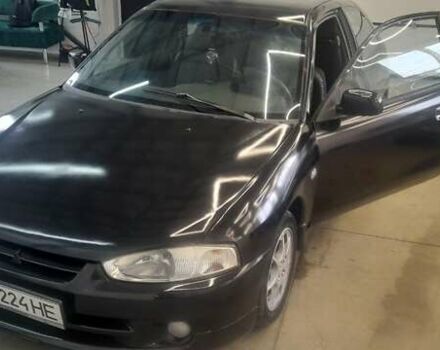 Чорний Міцубісі Кольт, об'ємом двигуна 1.3 л та пробігом 258 тис. км за 3650 $, фото 1 на Automoto.ua