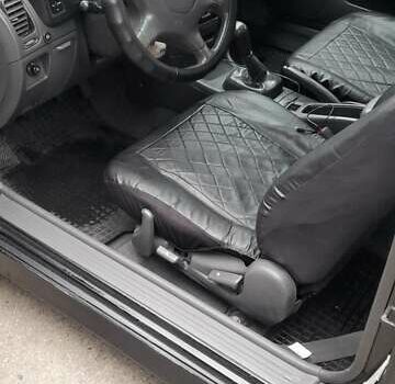 Чорний Міцубісі Кольт, об'ємом двигуна 1.3 л та пробігом 258 тис. км за 3650 $, фото 7 на Automoto.ua