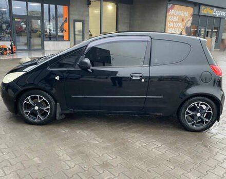 Черный Мицубиси Кольт, объемом двигателя 1.3 л и пробегом 114 тыс. км за 4000 $, фото 7 на Automoto.ua