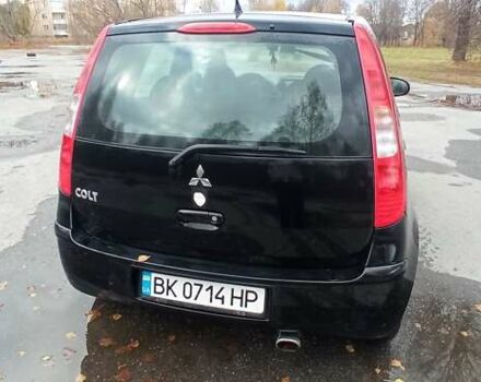 Міцубісі Кольт 2005 у Житомирі на Automoto.ua Чорний Міцубісі Кольт, об'ємом двигуна 1.33 л та пробігом 156 тис. км за 3598 $, фото 6 на Automoto.ua