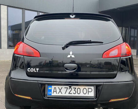 Черный Мицубиси Кольт, объемом двигателя 1.3 л и пробегом 114 тыс. км за 4000 $, фото 4 на Automoto.ua