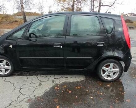 Міцубісі Кольт 2005 у Житомирі на Automoto.ua Чорний Міцубісі Кольт, об'ємом двигуна 1.33 л та пробігом 156 тис. км за 3598 $, фото 8 на Automoto.ua