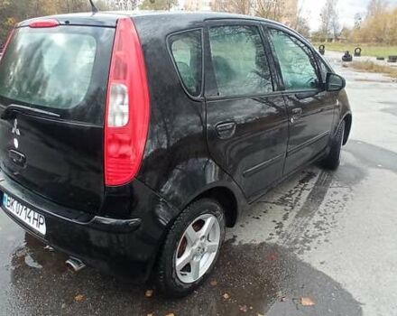 Міцубісі Кольт 2005 у Житомирі на Automoto.ua Чорний Міцубісі Кольт, об'ємом двигуна 1.33 л та пробігом 156 тис. км за 3598 $, фото 1 на Automoto.ua
