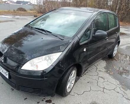 Міцубісі Кольт 2005 у Житомирі на Automoto.ua Чорний Міцубісі Кольт, об'ємом двигуна 1.33 л та пробігом 156 тис. км за 3598 $, фото 21 на Automoto.ua