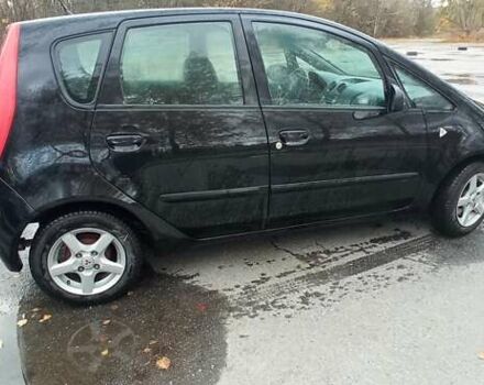 Міцубісі Кольт 2005 у Житомирі на Automoto.ua Чорний Міцубісі Кольт, об'ємом двигуна 1.33 л та пробігом 156 тис. км за 3598 $, фото 2 на Automoto.ua