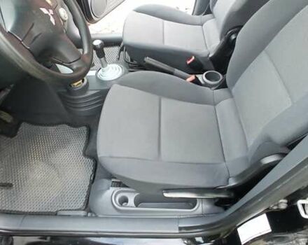 Міцубісі Кольт 2005 у Житомирі на Automoto.ua Чорний Міцубісі Кольт, об'ємом двигуна 1.33 л та пробігом 156 тис. км за 3598 $, фото 5 на Automoto.ua