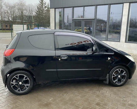 Черный Мицубиси Кольт, объемом двигателя 1.3 л и пробегом 114 тыс. км за 4000 $, фото 5 на Automoto.ua