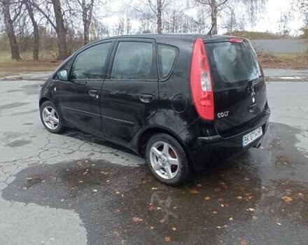 Міцубісі Кольт 2005 у Житомирі на Automoto.ua Чорний Міцубісі Кольт, об'ємом двигуна 1.33 л та пробігом 156 тис. км за 3598 $, фото 13 на Automoto.ua