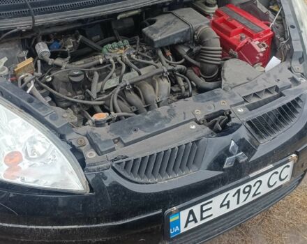 Чорний Міцубісі Кольт, об'ємом двигуна 1.3 л та пробігом 200 тис. км за 500 $, фото 7 на Automoto.ua