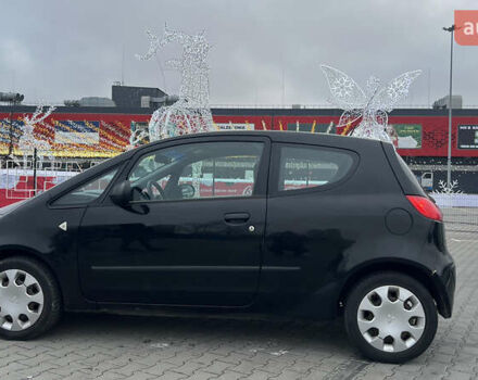 Чорний Міцубісі Кольт, об'ємом двигуна 1.3 л та пробігом 134 тис. км за 3600 $, фото 3 на Automoto.ua