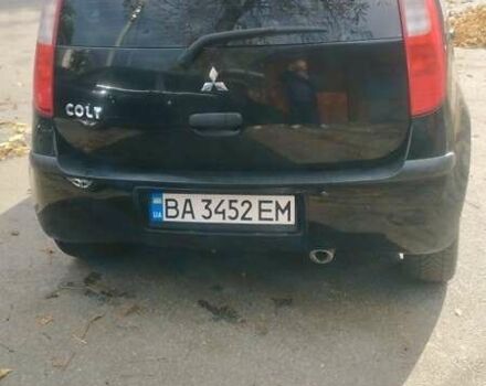 Чорний Міцубісі Кольт, об'ємом двигуна 1.3 л та пробігом 215 тис. км за 3800 $, фото 6 на Automoto.ua