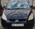 Черный Мицубиси Кольт, объемом двигателя 1.3 л и пробегом 215 тыс. км за 4300 $, фото 1 на Automoto.ua
